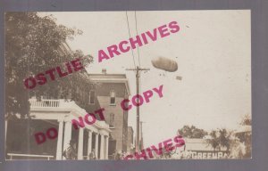 Red Oak IOWA c1910 AIRSHIP Coey Flyer Dirigible LANDING ON HOTEL JOHNSON IA