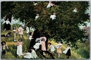 MULTIPLE BABIES in TREE SHADE ANTIQUE POSTCARD