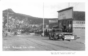 H33/ Rollinsville Colorado RPPC Postcard 40s Redmans General Store Gas Station
