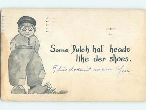 Divided-Back signed BOY NOTES THAT SOME DUTCH PEOPLE HAVE WOODEN HEADS o8596