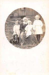 Old Woman with Chilren and Dog Real Photo Antique Postcard J46310