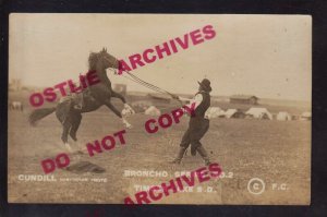 Timber Lake SOUTH DAKOTA RPPC c1910 SIOUX INDIAN COWBOY Breaking Horse CUNDILL