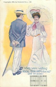 When were walking sticks first introduced? Puzzle Postcard of Man & Woman