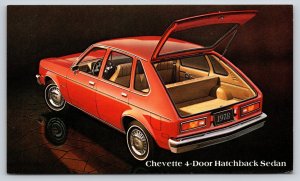Automobile~Red 1978 Chevrolet Chevette 4-Door Hatchback Sedan~Vintage Postcard