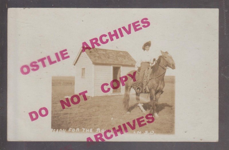 SD rppc c1910 COWGIRL Prairie CLAIM SHACK Ranch READY FOR ROUNDUP Leeland