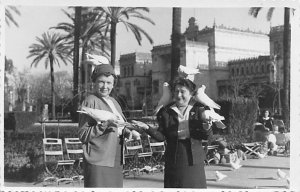 Pigeons on women's head Pidgeons 1956 