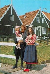 Family from Marken Holland Netherland folk costumes typical houses