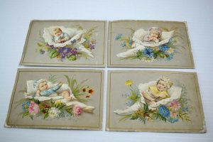 1880's Lot of 4 Embossed Victorian Trade Cards Babies In Shells Flowers F60