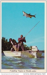 Fishing A Fighting Tarpon At Everglades National Park In Florida Waters