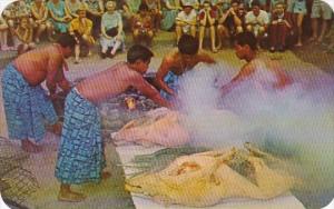 Hawaii Luau Preparations Cooking The Pig