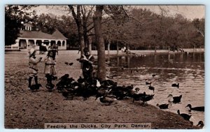 DENVER, CO Colorado ~ Children FEEDING the DUCKS in CITY PARK  c1910s Postcard