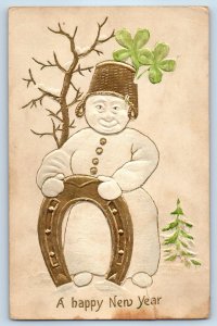 c1910's New Year Snowman Basket Hat With Horseshoe Clover Embossed Postcard