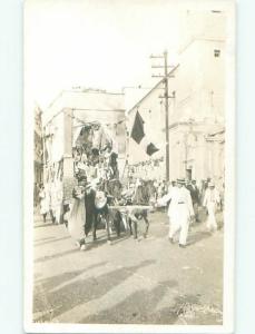 rppc Pre-1918 HORSE-DRAWN PARADE FLOAT GOING DOWN STREET AC7675