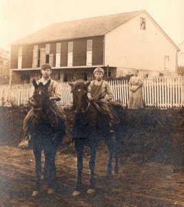 RPPC  Young Adults on Horses  Barn  Farm  c1910   Postcard