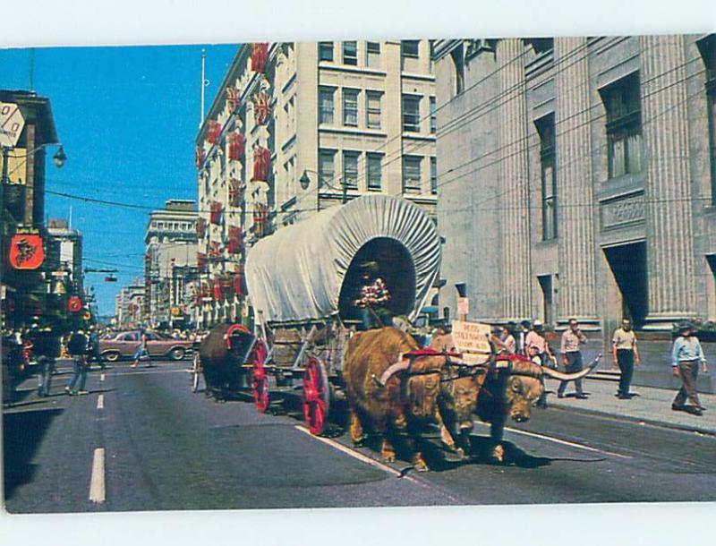 Pre-1980 OXEN PULLING CHUCKWAGON BY SHOPS ON STREET Calgary Alberta AB F0473