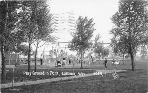 H7/ Laramie Wyoming Postcard RPPC 1915 Playground Swings Park