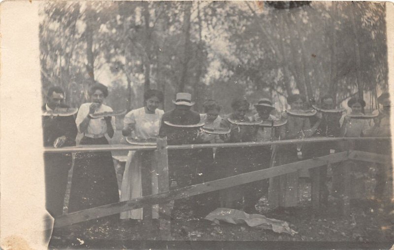 F47/ Interesting RPPC Postcard Eating Watermelon Schuyler Nebraska Camp 13