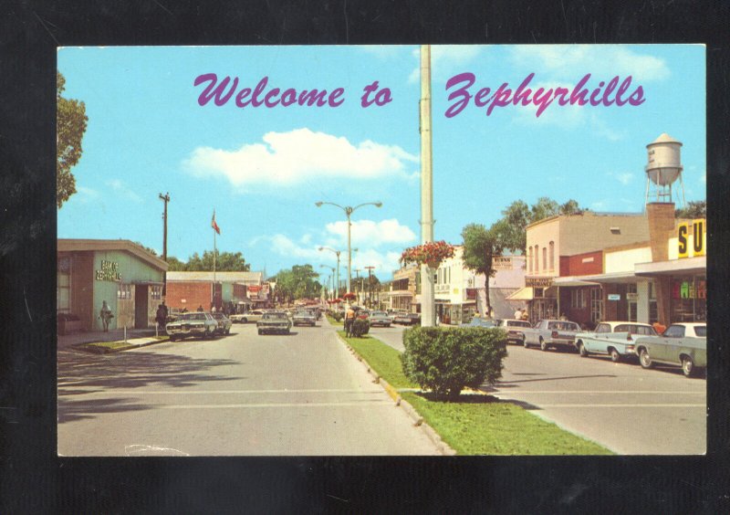 WELCOME TO ZEPHYRHILLS FLORIDA DOWNTOWN STREET SCENE OLD CARS POSTCARD