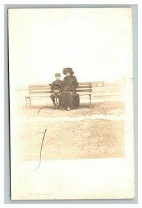 Vintage 1910's RPPC Postcard Photo of Mother and Son on Park Bench