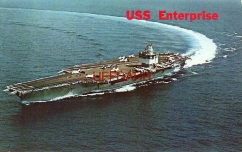 NUCLEAR POWERED ATTACK CARRIER USS ENTERPRISE SHOWN IN A HIGH SPEED TURN 