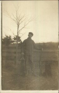 Hunting Man Poses w/ Gun Dog & Dead Raccoon c1910 Real Photo Postcard