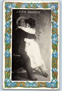 c1910's Romance Couple Hugging I O U A Squeeze Blue Flowers Embossed Postcard