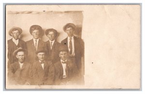 Postcard Group Of Seven Men In Suits And Hats Posing RPPC