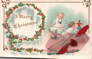 Vintage Postcard A Merry Christmas Children Playing In The Winter Wreath Border
