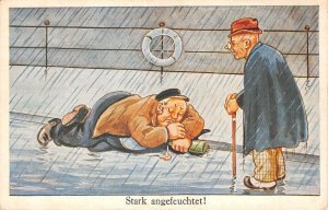 Lot 77 heavily moistened drunk man sleeping  in rain  comic germany