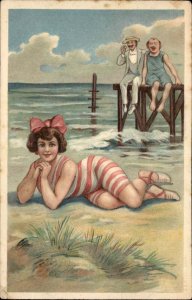 Bathing Beauty Woman Men Gawk From Pier Embossed c1910 Postcard