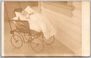 Baby Infant Asleep In Push Stroller Buggy RPPC Real Photo c1910 Postcard