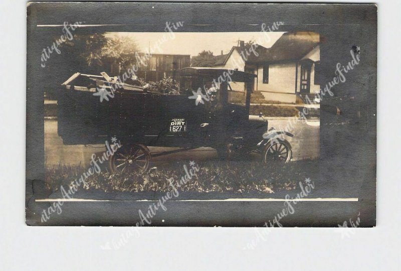 RPPC REAL PHOTO POSTCARD ANTIQUE PICK UP TRUCK LICENSED TO HAUL DIRT MAN POSES N