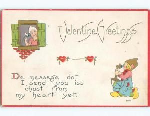 Pre-Linen valentine GIRL AND BOY TALKING ON ANTIQUE TELEPHONES k5710