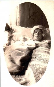 RPPC -  New Mother with her baby - c1920