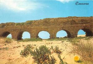 BG9567 the roman aqueduct partly buried in the sand  caesarea  israel