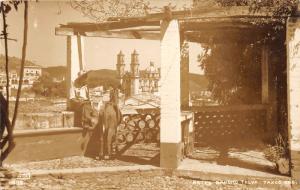 Taxco Guerrero Mexico~Hotel Rancho~Man with Donkey on Patio~1940s RPPC