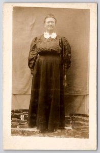 RPPC Victorian Woman Standing On Beautiful Quilt c1910 Real Photo Postcard C41