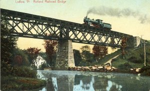 Postcard Early View of Train crossing Rutland Railroad Bridge in Rutland, VT.