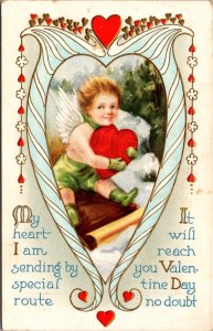 Valentine's Day Postcard Cherub Angel Holding Heart on Sled Through Snow