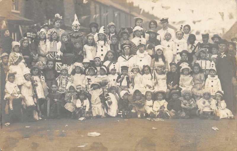 RPPC Peace Celebration Kids Dressed As Clowns UK? WWI 1919 Vintage Postcard 