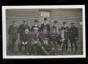 su3623 - Workmen, Vicar, & Boy pose outside the Timekeepers Office - postcard