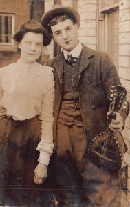 YOUNG MAN & WOMAN MANDOLIN~NEWMILNS SCOTLAND TO GRAYSON SASK~1906 PHOTO POSTCARD