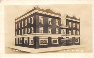 G41/ Franklin Nebraska RPPC Postcard c1920s Hotel Feese Pharmacy Building