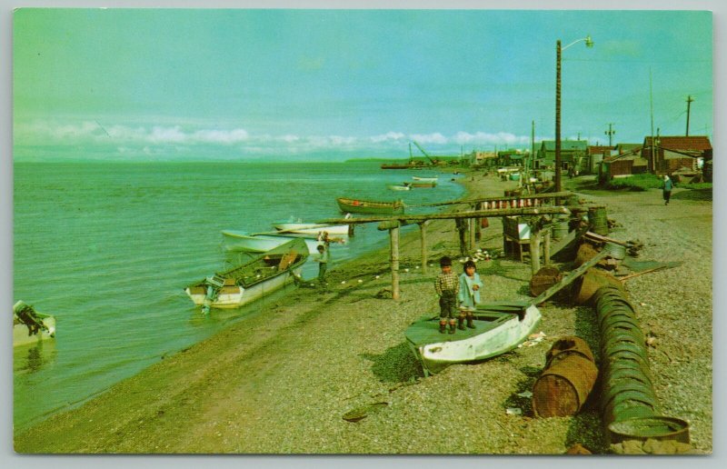 Kotzebue Alaska~Eskimo Kids Stand On Upside-Down Rowboat~Old Barrels~Vintage PC