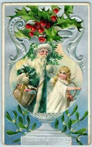 C. 1910 Blue Coat Santa Claus Angel Postcard P66 