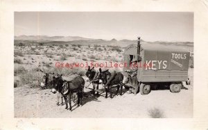 Donkeys Pulling a Wagon advertisng Keys Tools Sharpened, Desert, RPPC