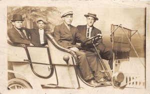 J32/ Interesting RPPC Postcard c1910 Early Automobile Studio Men Hats 299