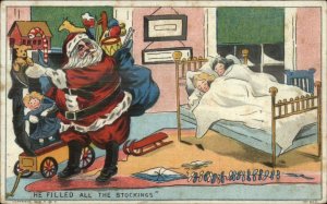 Christmas - Santa Claus Filled All the Stockings Sleeping Children Postcard