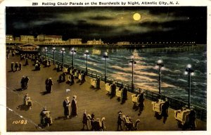 Atlantic City. New Jersey - The Rolling Chair Parade on the Boardwalk at Night