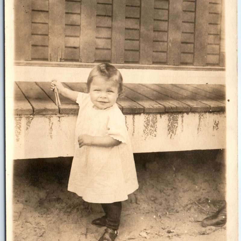 c1910s Adorable Baby Outdoors Smile RPPC w/ Clothespin Real Photo PC House A185